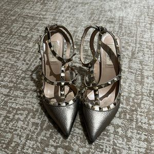 Gold Valentino heels with gold studs